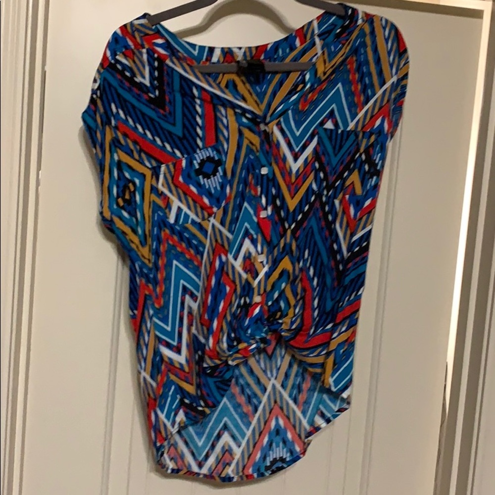 Small tribal tee never worn